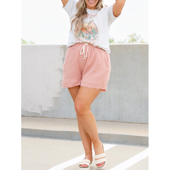 Pink split raw lace up shorts